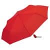 rött hopfällbart paraply